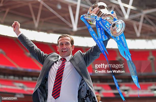 Newport County A.F.C manager Justin Edinburgh celebrates with the trophy after winning the Blue Square Bet Premier Conference Play-off Final between...