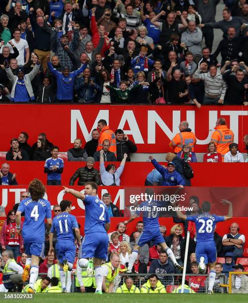 Juan Mata of Chelsea celebrates scoring their first goal during the Barclays Premier League match between Manchester United and Chelsea at Old...