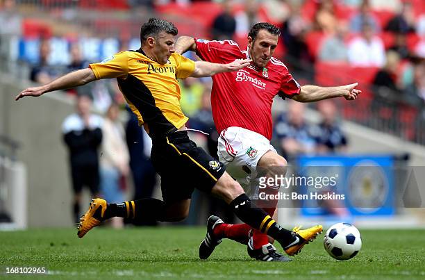 Byron Anthony of Newport battles with Glenn Little of Wrexham during the Blue Square Bet Premier Conference Play-off Final match between Wrexham and...