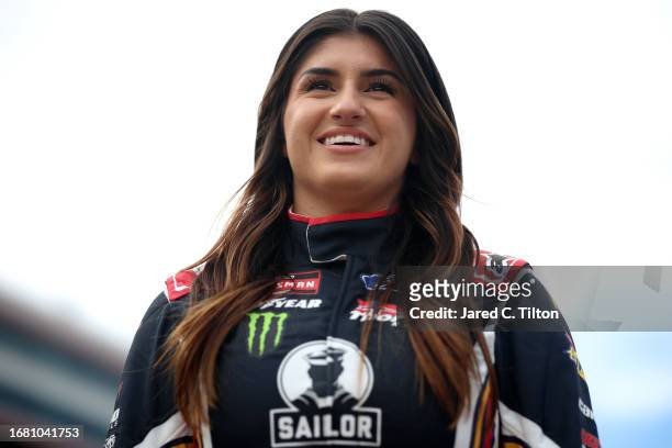 Hailie Deegan, driver of the America's Navy Ford, looks on during practice for the NASCAR Craftsman Truck Series UNOH 200 presented by Ohio Logistics...