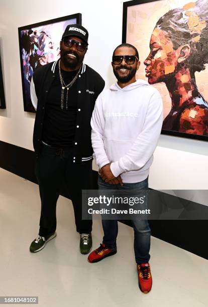 Dereck Chisora and Noel Clarke attend the "Radiant Resilience" debut exhibition from Zara Muse at Quantus Gallery Shoreditch on September 21, 2023 in...