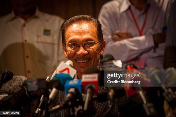 Anwar Ibrahim, Malaysia's opposition leader, smiles during a news conference at the One World Hotel in Kuala Lumpur, Malaysia, on Sunday, May 5,...