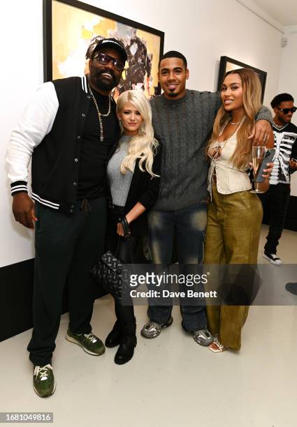 Dereck Chisora, Danielle Harold, Tyrique Hyde and Ella Thomas attend the "Radiant Resilience" debut exhibition from Zara Muse at Quantus Gallery...