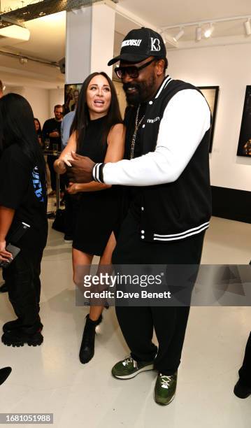 Katya Jones and Dereck Chisora attend the "Radiant Resilience" debut exhibition from Zara Muse at Quantus Gallery Shoreditch on September 21, 2023 in...