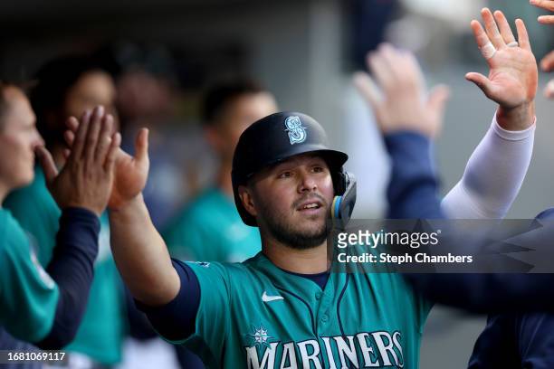 Ty France of the Seattle Mariners celebrates a run against the Los Angeles Angels during the fifth inning at T-Mobile Park on September 13, 2023 in...
