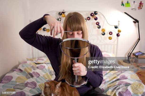 hairdressing from home - bangs hair stock pictures, royalty-free photos & images