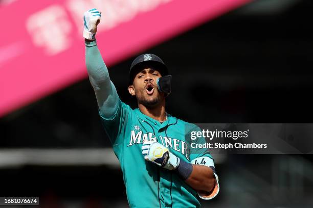 Julio Rodriguez of the Seattle Mariners reacts after his RBI double during the third inning against the Los Angeles Angels at T-Mobile Park on...