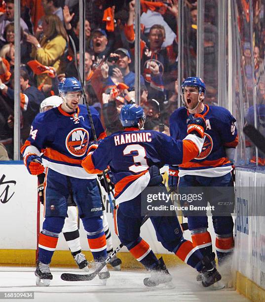 John Tavares of the New York Islanders ties the score at 4-4 against the Pittsburgh Penguins at 10:48 of the third period and is joined by Brad Boyes...