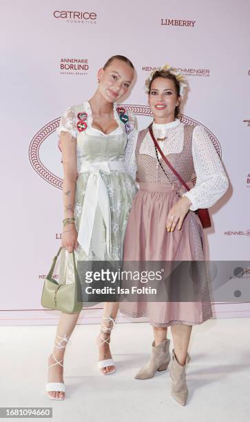 Cheyenne Ochsenknecht and Laura Osswald during the Madlwiesn at Styling Lounge at Hotel Bayerischer Hof on September 21, 2023 in Munich, Germany.