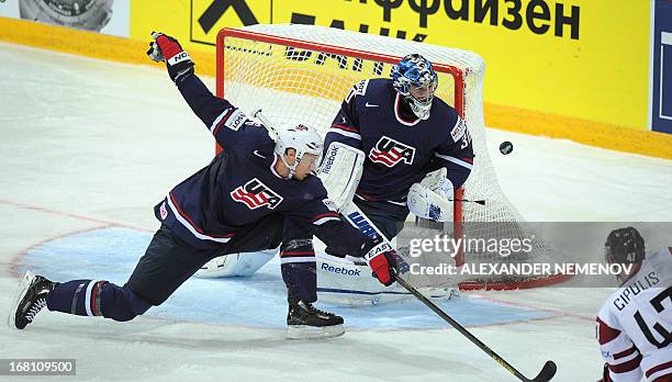 Defender Erik Johnson tries to score during the preliminary round match Latvia vs United States of the IIHF International Ice Hockey World...