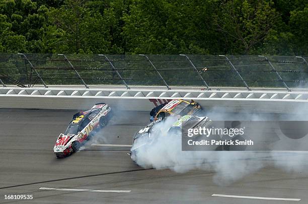 Greg Biffle, driver of the 3M Safety Ford, Kasey Kahne, driver of the Time Warner Cable Chevrolet, Kyle Busch, driver of the M&M's Toyota and Casey...