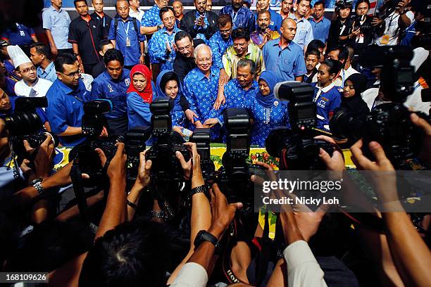 Malaysia's Prime Minister and Barisan Nasional chairman Najib Razak celebrates his victory with a prayer on election day at the PWTC on May 5, 2013...