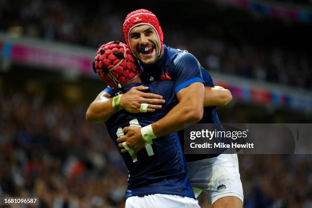 Louis Bielle-Biarrey of France celebrates with Gabin Villiere of France after scoring his team's third try during the Rugby World Cup France 2023...