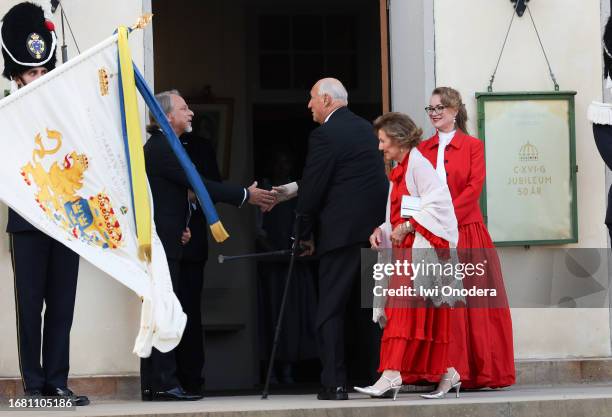 King Harald V and Queen Sonja of Norway arrive to the Royal Swedish Opera's jubilee performance at Drottningholm Palace Theatre on September 14, 2023...