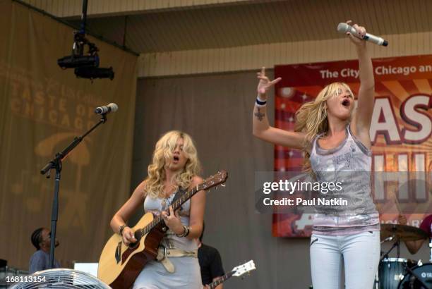 American sibling pop musicians and actresses Alyson and Amanda Michalka, who perform as Aly and AJ , play on the Petrillo Band Shell in Grant Park...