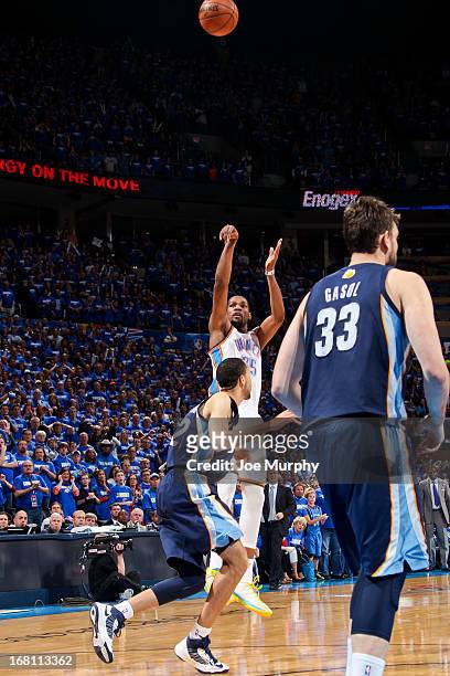 Kevin Durant of the Oklahoma City Thunder makes a go-ahead shot late in the fourth quarter, leading to the team's victory, against Tayshaun Prince of...