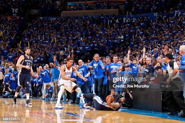 Thabo Sefolosha of the Oklahoma City Thunder celebrates after Mike Conley of the Memphis Grizzlies was called out-of-bounds late in the fourth...