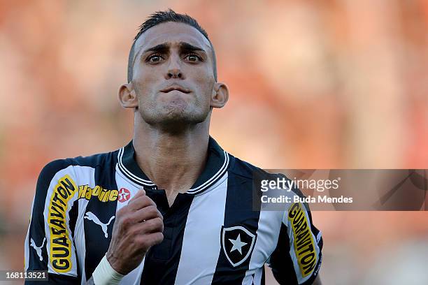 Rafael Marques of Botafogo celebrates a scored goal during the match between Fluminense and Botafogo as part of Carioca Championship 2013 at Raulino...