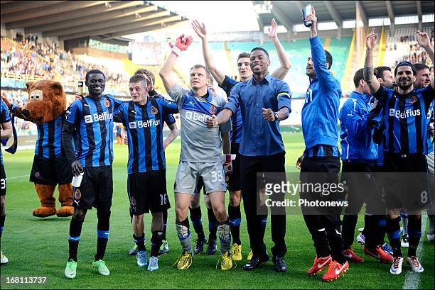 Club Brugge players celebrate during the Jupiler Pro League play-off 1 match between Club Brugge and Sporting Lokeren on May 5, 2013 in Brugge,...