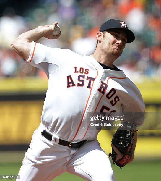 Philip Humber of the Houston Astros pitches in the first inning against the Detroit Tigers at Minute Maid Park on May 5, 2013 in Houston, Texas.