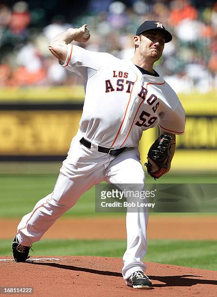 Philip Humber of the Houston Astros pitches in the first inning against the Detroit Tigers at Minute Maid Park on May 5, 2013 in Houston, Texas.