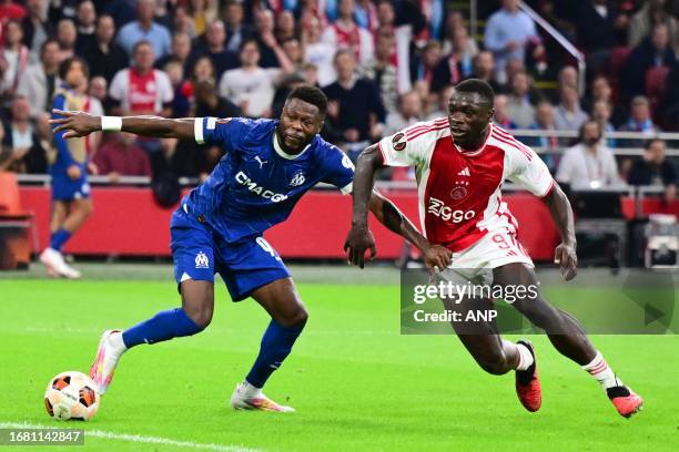 Brian Brobbey of Ajax, Chancel Mbemba of Marseille during the UEFA Europa League match between Ajax Amsterdam and Olympique de Marseille at the Johan...