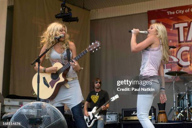 American sibling pop musicians and actresses Alyson and Amanda Michalka, who perform as Aly and AJ , play on the Petrillo Band Shell in Grant Park...