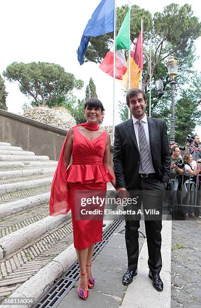 Actress Ana Laura Ribas and fiance Marco Uzzo arrive at the Valeria Marini And Giovanni Cottone wedding at Ara Coeli on May 5, 2013 in Rome, Italy.