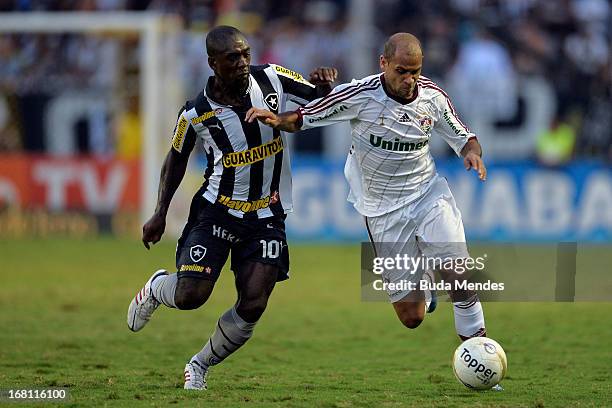 Wagner of Fluminense fights for the ball with Seedorf of Botafogo during a match between Fluminense and Botafogo as part of Rio State Championship...