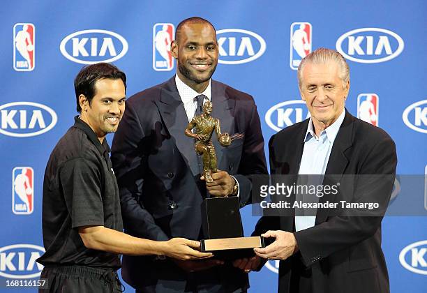 Erik Spoelstra, LeBron James and Pat Riley attend the LeBron James press confernece to announce his 4th NBA MVP Award at American Airlines Arena on...