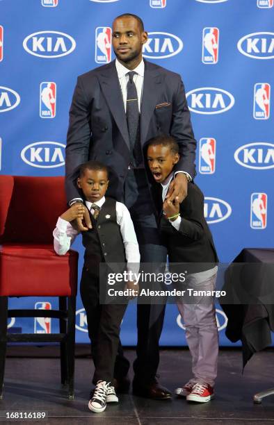 Bryce James, LeBron James and LeBron James Jr attend the LeBron James press confernece to announce his 4th NBA MVP Award at American Airlines Arena...