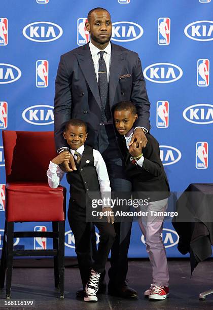 Bryce James, LeBron James and LeBron James Jr attend the LeBron James press confernece to announce his 4th NBA MVP Award at American Airlines Arena...