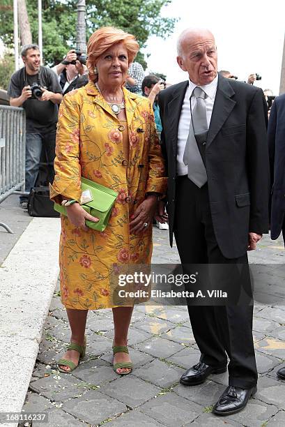 Fausto Bertinotti and wife Gabriella Fagno arrive at the Valeria Marini and Giovanni Cottone wedding at Ara Coeli on May 5, 2013 in Rome, Italy.