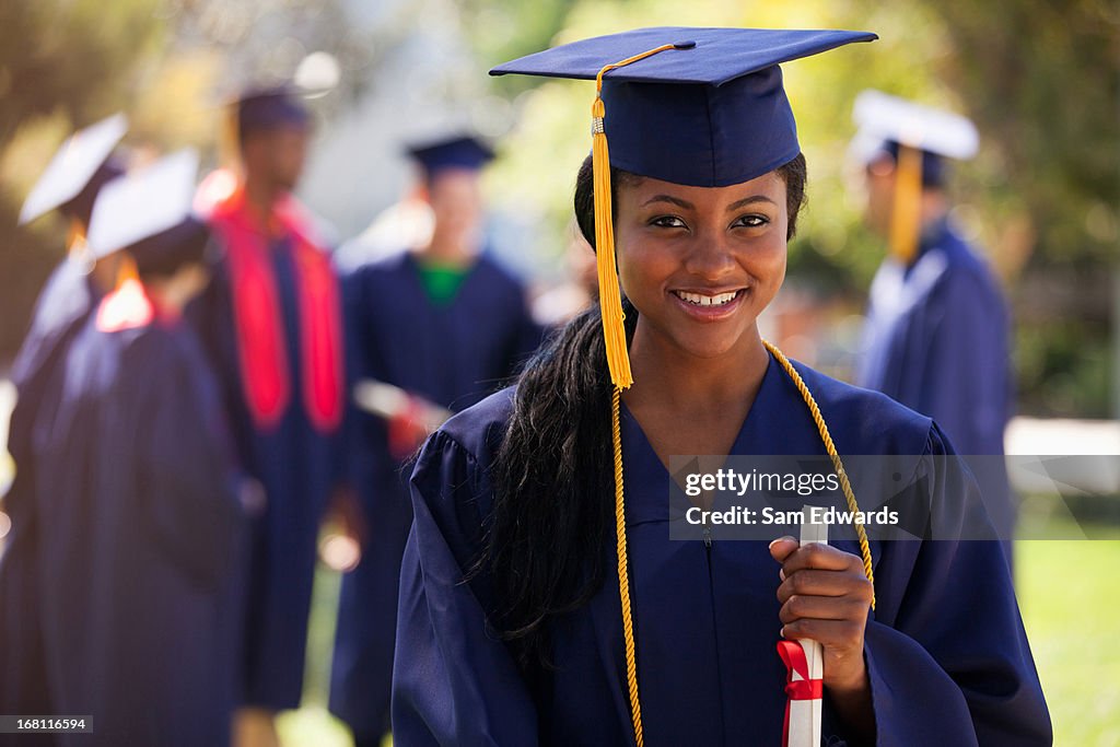 Graduate Def Graduate In Cap And Gown High-Res Stock Photo - Getty Images