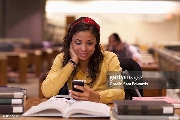 student studying in library - samuser stock pictures, royalty-free photos & images