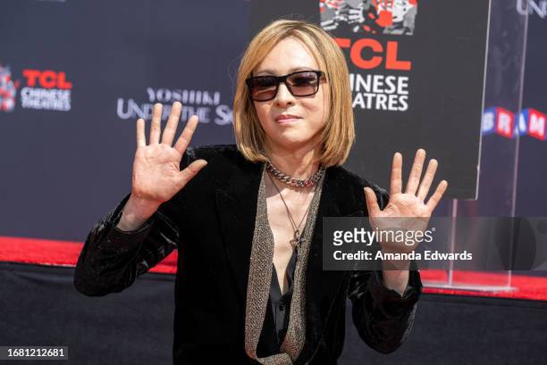 Musician Yoshiki attends his hand and footprint in cement ceremony at the TCL Chinese Theatre on September 14, 2023 in Hollywood, California.
