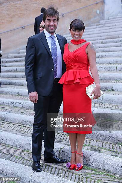 Marco Uzzo and Ana Laura Ribas attend the the Valeria Marini and Giovanni Cottone wedding at Ara Coeli on May 5, 2013 in Rome, Italy.