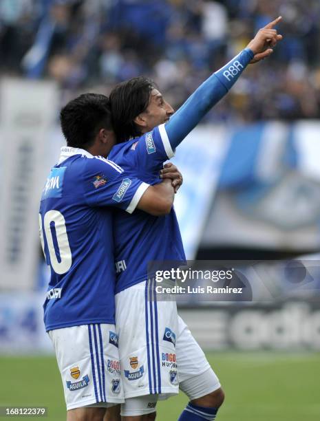 Players of Millonarios celebrate a goal against Patriotas during a match between Millonarios and Patriotas as part of Liga Postobon 2013 at the...