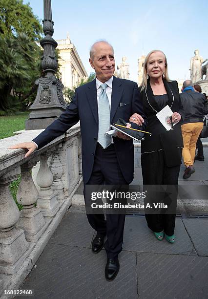 Pippo Franco and wife arrive at the Valeria Marini And Giovanni Cottone wedding at Ara Coeli on May 5, 2013 in Rome, Italy.