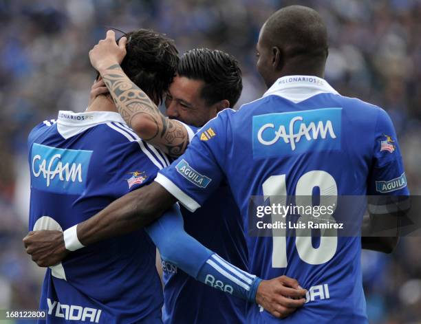 Players of Millonarios celebrate a goal against Patriotas during a match between Millonarios and Patriotas as part of Liga Postobon 2013 at the...