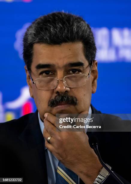 President of Venezuela Nicolas Maduro gestures during a meeting with the 'Consejo Nacional de Economía Productiva' at Humboldt Hotel on September 21,...