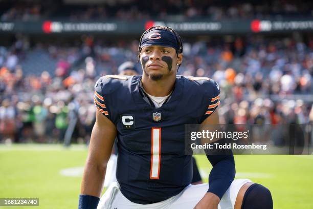 Quarterback Justin Fields of the Chicago Bears warms up prior to an NFL football game against the Green Bay Packers at Soldier Field on September 10,...