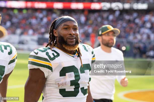 Running back Aaron Jones of the Green Bay Packers looks on during an NFL football game against the Chicago Bear at Soldier Field on September 10,...