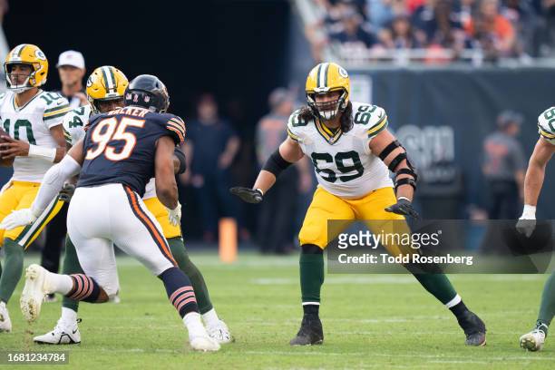 Offensive Tackle David Bakhtiari of the Green Bay Packers looks to make a block during an NFL football game against the Chicago Bear at Soldier Field...