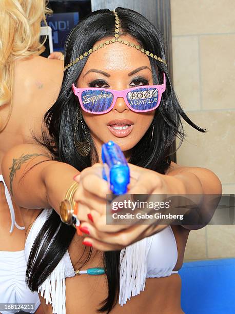 Adult film actress Kaylani Lei poses at Sapphire Pool & Day Club grand opening party on May 5, 2013 in Las Vegas, Nevada.