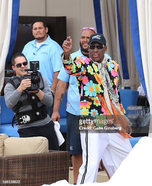 Former NBA player Dennis Rodman dances at Sapphire Pool & Day Club grand opening party on May 5, 2013 in Las Vegas, Nevada.