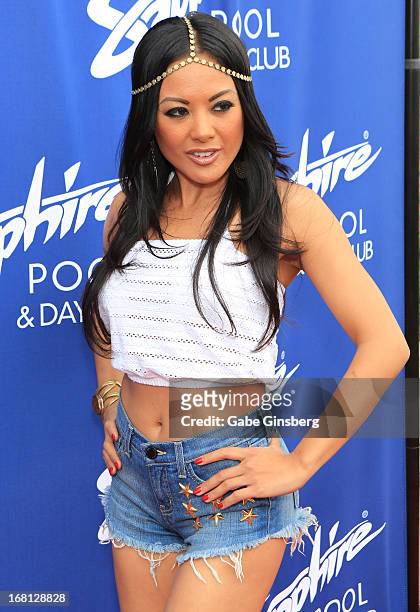 Adult film actress Kaylani Lei poses at Sapphire Pool & Day Club grand opening party on May 5, 2013 in Las Vegas, Nevada.