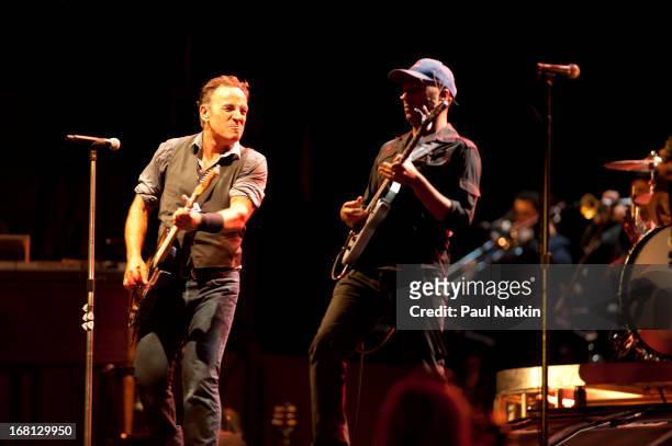 American rock musician Bruce Springsteen performs on stage with the E Street Band and special guest Tom Morello during the 'Wrecking Ball' tour at...