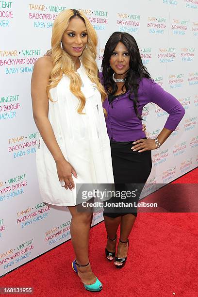 Tamar Braxton and Toni Braxton attend the Tamar Braxton Hosts Carnival-Themed Baby Shower With Friends And Family at Hotel Bel-Air on May 5, 2013 in...