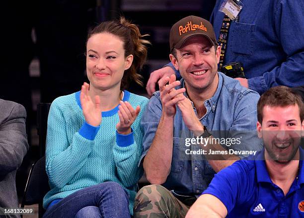 Olivia Wilde and Jason Sudeikis attend the New York Knicks vs Indiana Pacers NBA playoff game at Madison Square Garden on May 5, 2013 in New York...